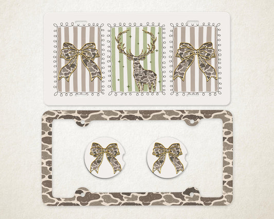 May include: A decorative car accessory set featuring a license plate frame, license plate cover, and two car coasters. The license plate cover and coasters have a giraffe print. The license plate cover has a bow design. The license plate cover has a deer design.